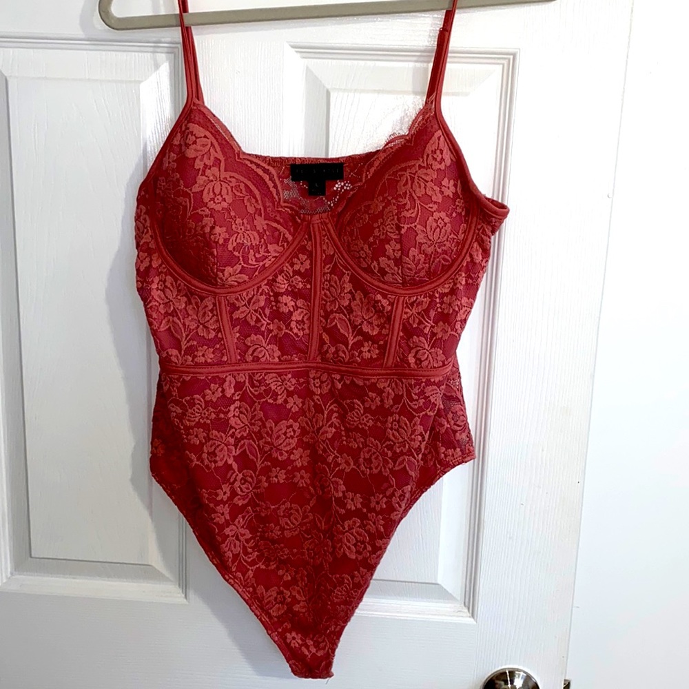 Old pink lace bodysuit